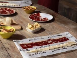 CorSevilla y la firma Marta Ovelar se unen para llevar el producto artesano y de cercanía a la Feria de Sevilla 2025 - Gastronomía y Moda